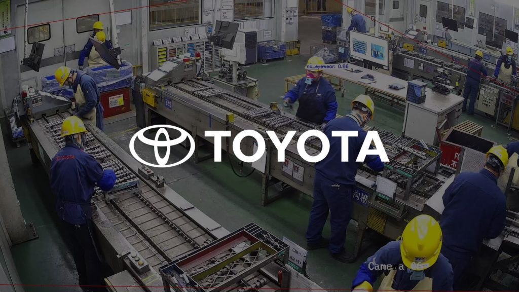 Toyota factory workers monitored by TensorVox AI for helmet and safety goggle compliance